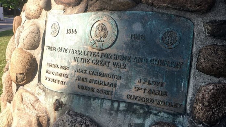 Removed heritage feature: St. Giles WW1 plaque on War Memorial cairn at 85 Holton Ave S